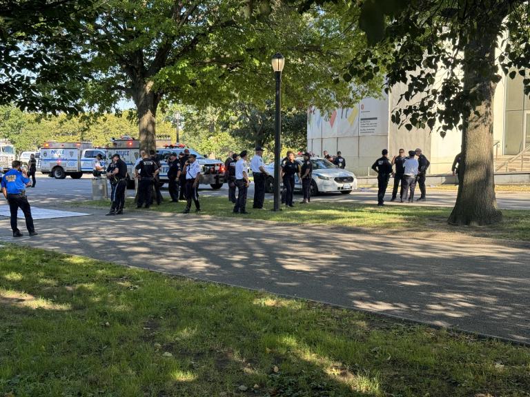 Northern Boulevard at 107th: one red light, one life, and a district on edge