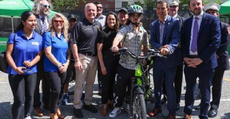 125th Street, a boy on a bike, and the long tally