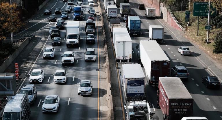 Astoria Boulevard, just before noon